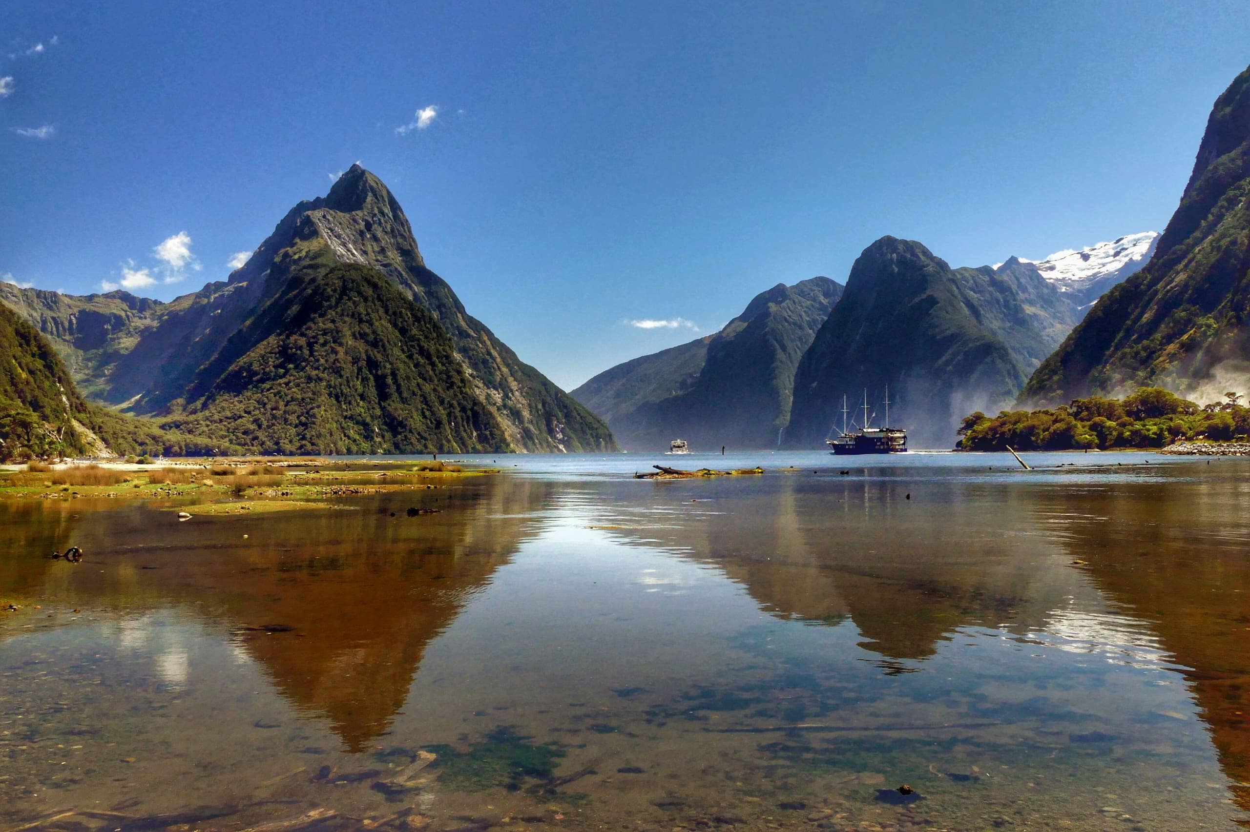Mitre Peak rising above the still waters of Milford Sound in Fiordland